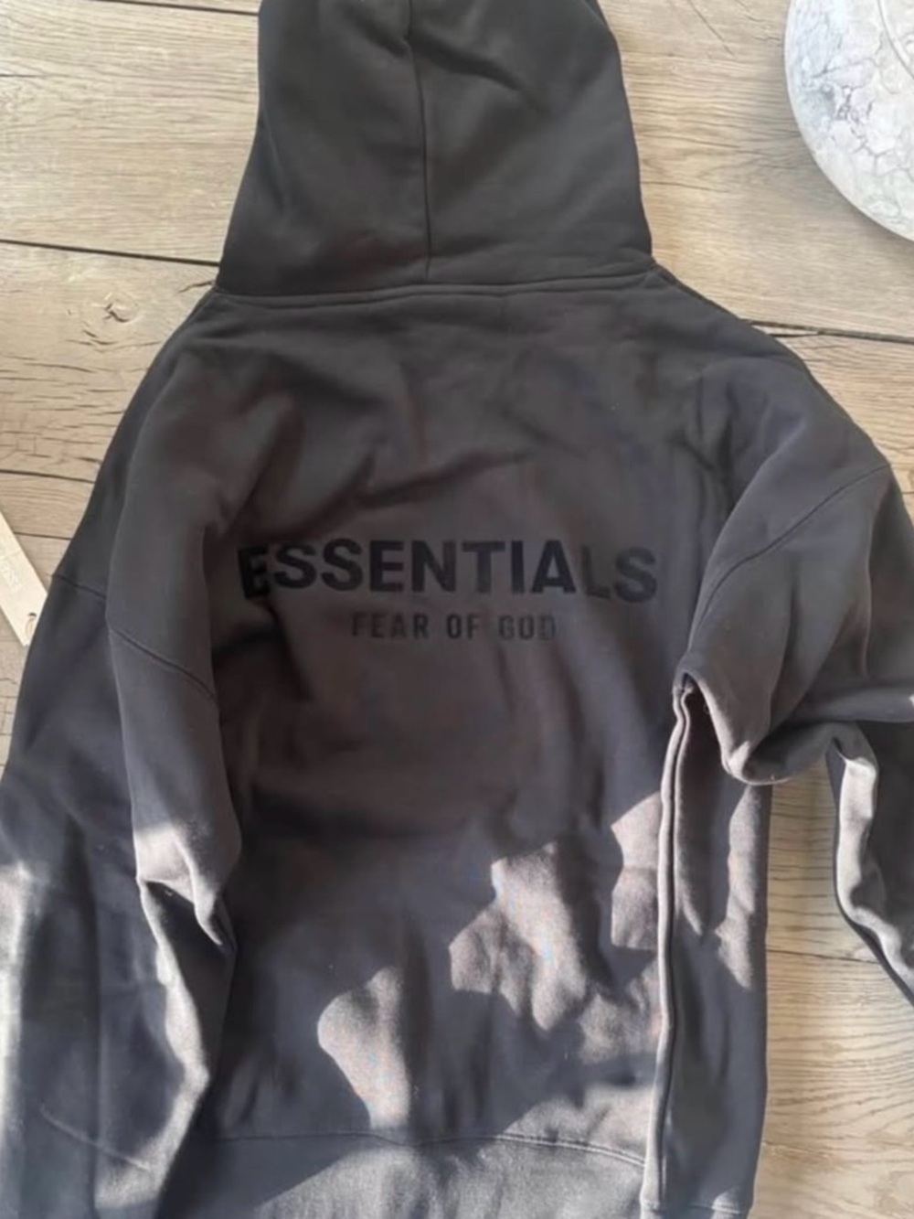 Fear of God Essentials Black Pullover Hoodie with Back Logo